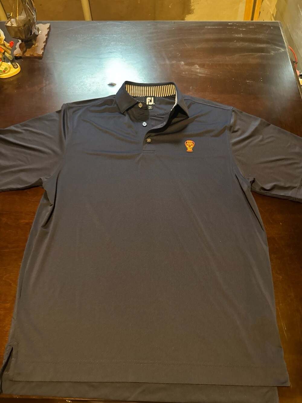 FootJoy Men's USC Trojans Black Performance Golf Polo with Trophy Logo